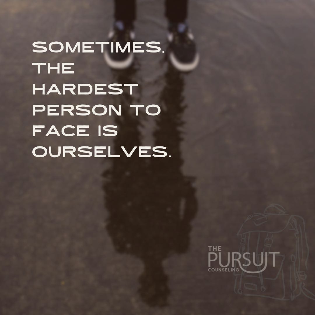 human shadow in a puddle of water. text says "sometimes the hardest person to face is ourselves"