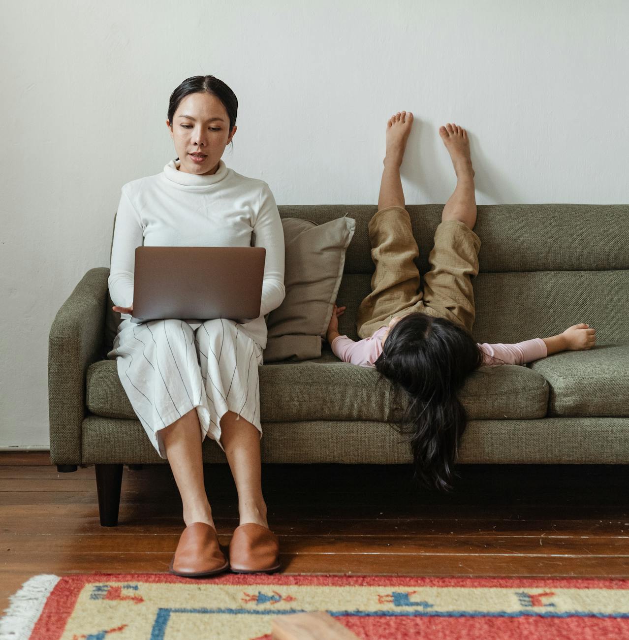 photo of mother working at home