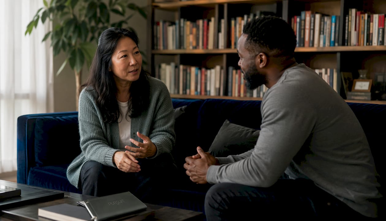 Couple having calm talk on sofa